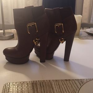 Brown high heeled boots
